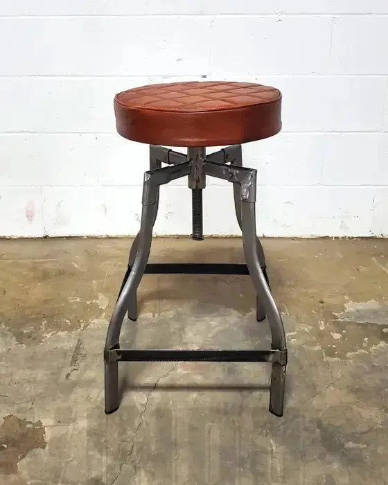 Tabouret de comptoir en cuir ajustable base d'acier noir ou brut